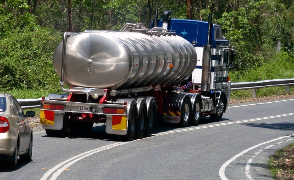 truck, tanker, water carrier, metal, vehicle, road, traffic, danger, steep, bend, slow, heavy, tanker, tanker, tanker, tanker, tanker
